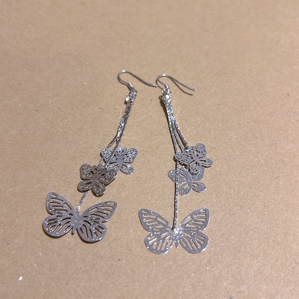 Butterfly Silver Dangly Earrings Blue Ruby